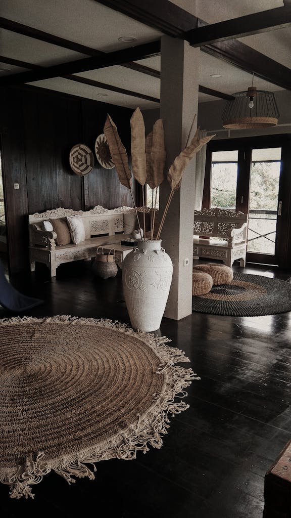 Cozy rustic living room with natural decor and vintage furniture, bathed in sunlight.